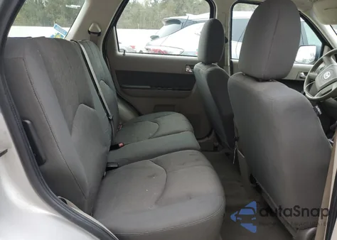 2009 Mazda Tribute I z USA, uszkodzony, nr VIN 4F2CZ02729KM01239